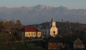 Magura's church and Bucegi mountains Magura and Bucegi Mountains